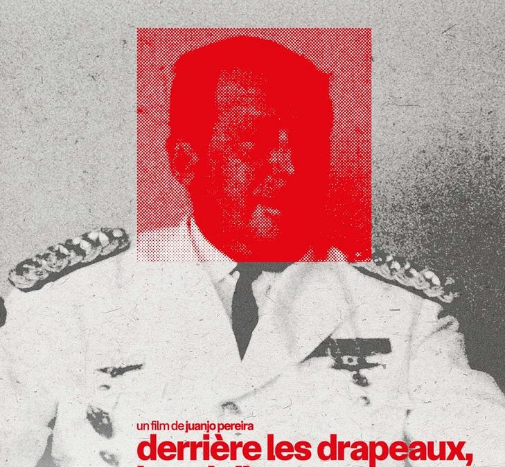 Derrière les drapeaux, le soleil